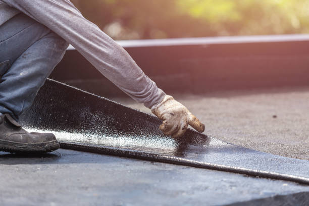 Professional Exterior Waterproofing technician working in Mulliken, MI
